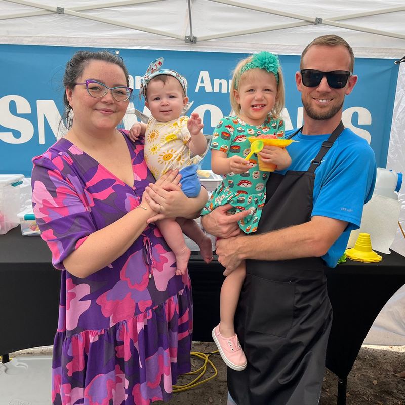 Steven Shumaker with his wife Annette and their two young daughters at the Grannie Annie's Snow Cones stand in Pensacola